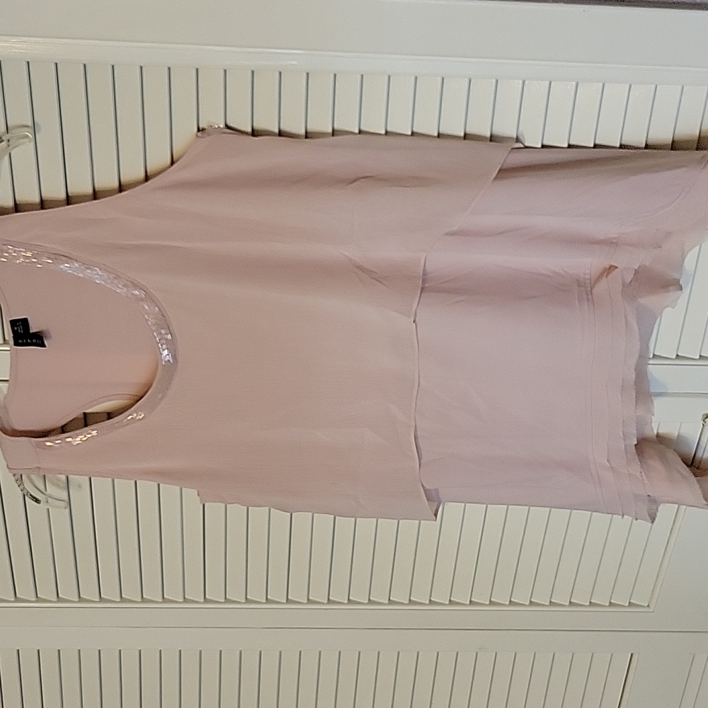 Pink sleeveless asymmetrical top